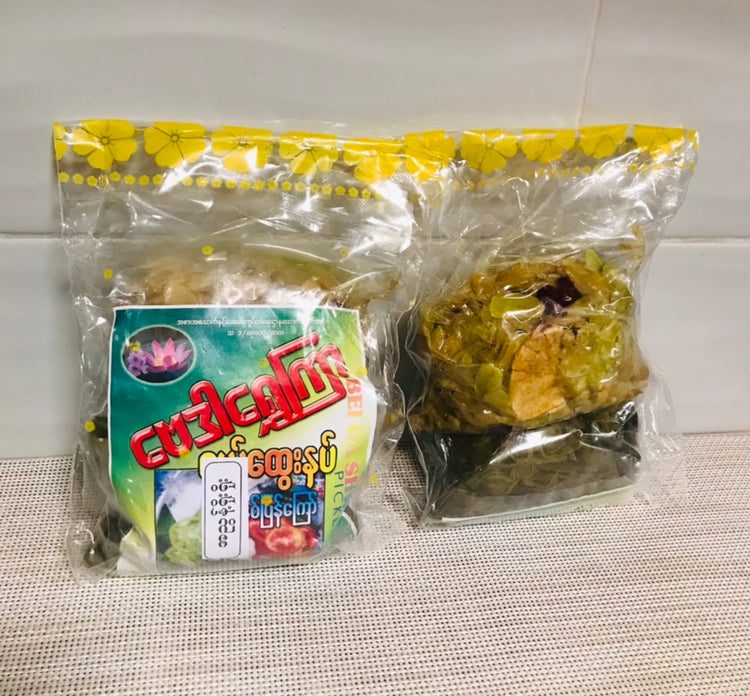 ဗေဒါရွှေကြာ လက်ဖက်ညွန့် ချဉ်စပ် နှင့် ပဲနှစ်ပြန်ကြော်